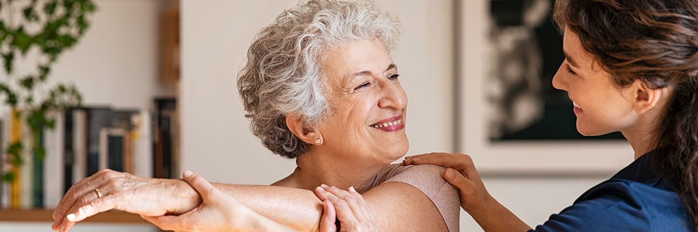 Senior woman getting physical therapy