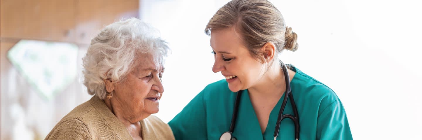 A senior and a caregiver