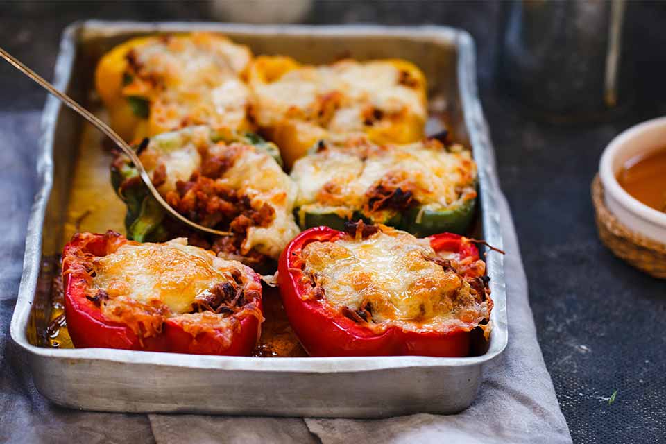 Stuffed belle peppers in a dish