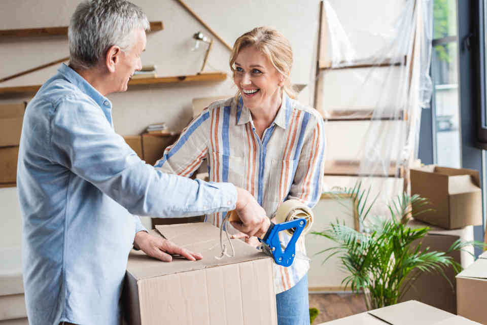 Elderly father and daughter moving to a new location